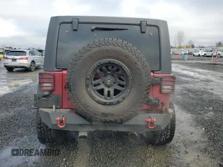 2012 Jeep Wrangler Unlimited Rubicon with VIN 1C4HJWFG2CL219021, listed as a Copart auction lot 87451784 with 109,675 mi miles and Salvage title. Bid and sale history available at DreamBid. Image 6.