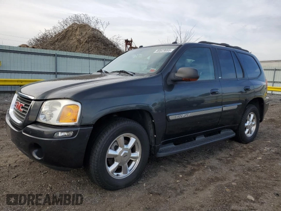 2004 GMC Envoy SLT z VIN 1GKDT13S042406662, wystawiony jako Copart lot #50523855 z przebiegiem 62 122 mil mil oraz Czysty tytuł • Clean title. Historia ofert i sprzedaży dostępna na DreamBid. Obrazek 1.