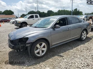 2014 Volkswagen Passat SEL Premium with VIN 1VWCN7A33EC100452, listed as a Copart auction lot 61363535 with 164,179 mi miles and Salvage title. Bid and sale history available at DreamBid. Image 1.
