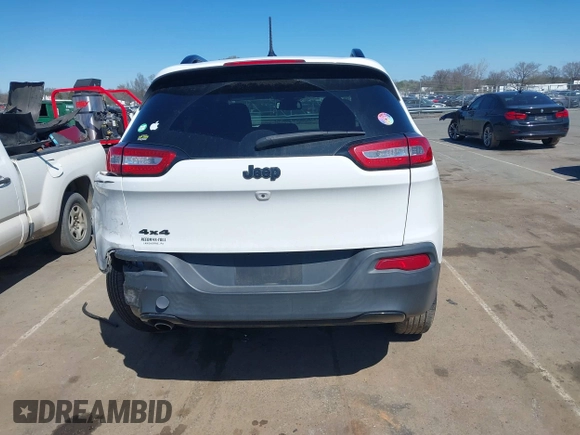 2016 Jeep Cherokee Sport with VIN 1C4PJMAB1GW314251, listed as a IAAI auction lot 41815330 with 124,588 mi miles. Bid and sale history available at carsss.com. Image 16.