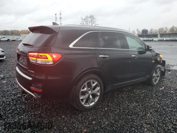 2016 Kia Sorento SXL z VIN 5XYPKDA19GG012725, wystawiony jako Copart lot #80313254 z przebiegiem 86 852 mil mil oraz Szkoda całkowita • Salvage title. Historia ofert i sprzedaży dostępna na DreamBid. Obrazek 3.