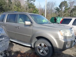 2011 Honda Pilot EX-L z VIN 5FNYF3H54BB033106, wystawiony jako IAAI lot #41110615 z przebiegiem 160 285 mil mil oraz . Historia ofert i sprzedaży dostępna na DreamBid. Obrazek 1.