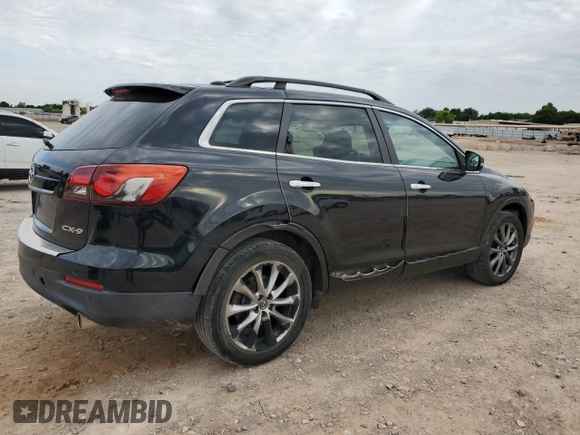 2015 Mazda CX-9 Grand Touring z VIN JM3TB2DA3F0452322, wystawiony jako Copart lot #57821285 z przebiegiem 147 610 mil mil oraz Czysty tytuł • Clean title. Historia ofert i sprzedaży dostępna na DreamBid. Obrazek 3.