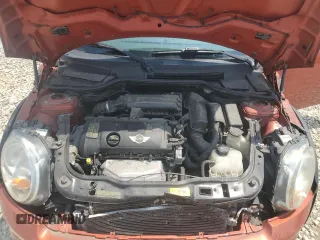 2013 MINI Hardtop z VIN WMWSU3C58DT545290, wystawiony jako Copart lot #59393825 z przebiegiem 112 943 mil mil oraz Szkoda całkowita • Salvage title. Historia ofert i sprzedaży dostępna na DreamBid. Obrazek 11.