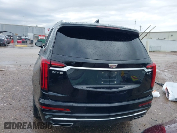 2023 Cadillac XT6 FWD Luxury with VIN 1GYKPAR44PZ114020, listed as a IAAI auction lot 41669115 with 110,305 mi miles and . Bid and sale history available at DreamBid. Image 17.