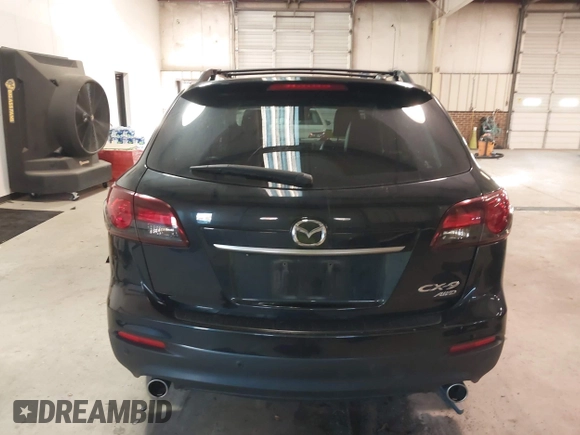 2015 Mazda CX-9 Grand Touring with VIN JM3TB3DV3F0460493, listed as a IAAI auction lot 41053565 with 213,124 mi miles. Bid and sale history available at carsss.com. Image 16.