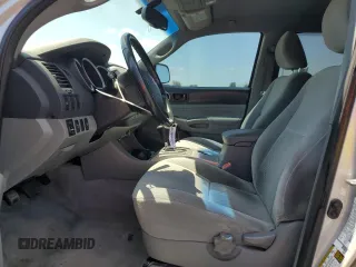 2010 Toyota Tacoma PreRunner with VIN 5TEJU4GN1AZ702394, listed as a Copart auction lot 54943375 with 117,625 mi miles and Salvage Title. Bid and sale history available at DreamBid. Image 7.