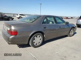 2003 Cadillac Seville Luxury SLS z VIN 1G6KS54Y93U279660, wystawiony jako Copart lot #75961404 z przebiegiem 107 591 mil mil oraz Szkoda całkowita • Salvage title. Historia ofert i sprzedaży dostępna na DreamBid. Obrazek 3.