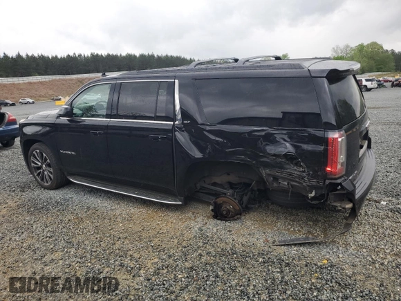 2017 GMC Yukon XL SLT with VIN 1GKS1GKC5HR332484, listed as a Copart auction lot 51957095 with 188,204 mi miles and Salvage Title. Bid and sale history available at DreamBid. Image 2.