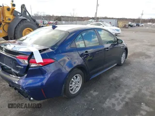 2021 Toyota Corolla Hybrid LE with VIN JTDEAMDE9MJ021431, listed as a IAAI auction lot 41747142 with 165,680 mi miles. Bid and sale history available at carsss.com. Image 4.