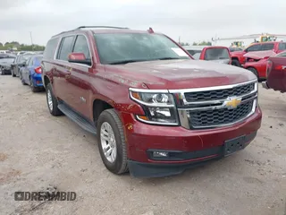 2020 Chevrolet Suburban LT z VIN 1GNSCHKC9LR233596, wystawiony jako IAAI lot #41943325 z przebiegiem 97 515 mil mil oraz . Historia ofert i sprzedaży dostępna na DreamBid. Obrazek 1.