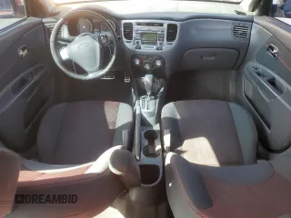 2009 Kia Rio SX with VIN KNADE223496514284, listed as a Copart auction lot 48550105 with 114,411 mi miles and Salvage Title. Bid and sale history available at carsss.com. Image 8.