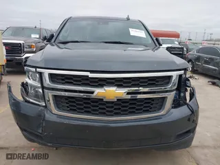 2019 Chevrolet Tahoe LT with VIN 1GNSCBKC8KR366460, listed as a IAAI auction lot 41384327 with 76,861 mi miles. Bid and sale history available at carsss.com. Image 13.