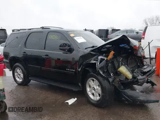 2012 Chevrolet Tahoe LT z VIN 1GNSCBE04CR227932, wystawiony jako IAAI lot #38472865 z przebiegiem 167 457 mil mil oraz . Historia ofert i sprzedaży dostępna na DreamBid. Obrazek 14.