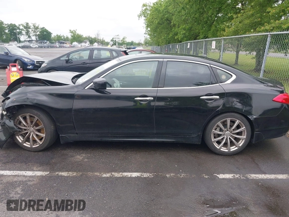 2011 Infiniti M z VIN JN1BY1AP1BM320784, wystawiony jako IAAI lot #42369027 z przebiegiem 256 664 mil mil oraz . Historia ofert i sprzedaży dostępna na DreamBid. Obrazek 14.