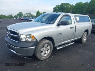 2015 Ram 1500 Tradesman with VIN 3C6JR7DGXFG631473, listed as a IAAI auction lot 42258733 with Not provided miles and . Bid and sale history available at DreamBid. Image 2.