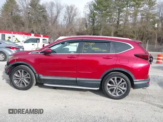 2020 Honda CR-V Touring with VIN 2HKRW2H90LH649017, listed as a IAAI auction lot 41701827 with 50,565 mi miles and . Bid and sale history available at DreamBid. Image 14.