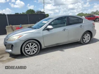 2012 Mazda 3 i Touring with VIN JM1BL1V78C1691157, listed as a Copart auction lot 60636315 with 137,124 mi miles and Salvage title. Bid and sale history available at DreamBid. Image 1.