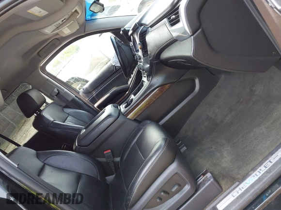 2015 Chevrolet Suburban LT with VIN 1GNSKJKC4FR222178, listed as a IAAI auction lot 42423080 with 234,870 mi miles and . Bid and sale history available at DreamBid. Image 5.