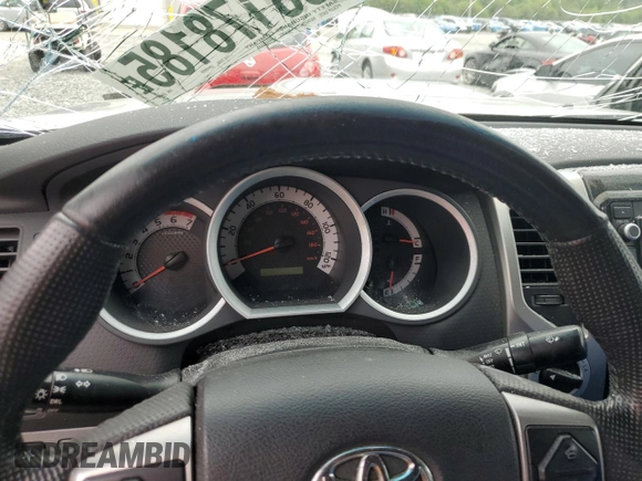 2014 Toyota Tacoma z VIN 5TFUU4EN7EX086617, wystawiony jako Copart lot #58178185 z przebiegiem Nie podano mil oraz Czysty tytuł • Clean title. Historia ofert i sprzedaży dostępna na DreamBid. Obrazek 9.