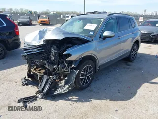 2021 Volkswagen Tiguan SE with VIN 3VV3B7AXXMM116774, listed as a IAAI auction lot 41868796 with Not Provided miles and . Bid and sale history available at DreamBid. Image 2.