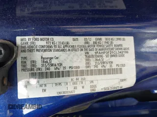 2012 Ford Focus SE with VIN 1FAHP3F21CL342199, listed as a IAAI auction lot 42119170 with 185,307 mi miles and . Bid and sale history available at carsss.com. Image 9.