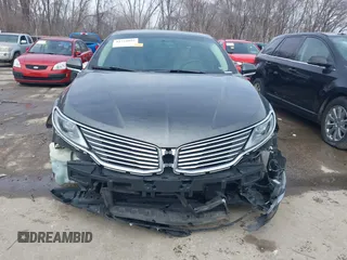 2015 Lincoln MKZ z VIN 3LN6L2JK4FR623686, wystawiony jako IAAI lot #41721095 z przebiegiem 197 922 mil mil oraz . Historia ofert i sprzedaży dostępna na DreamBid. Obrazek 13.