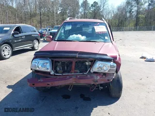2000 Suzuki Grand Vitara with VIN JS3TE62V5Y4102944, listed as a IAAI auction lot 41782009 with 179,765 mi miles. Bid and sale history available at carsss.com. Image 13.