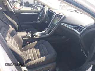2016 Ford Fusion SE Hybrid with VIN 3FA6P0LU1GR385184, listed as a IAAI auction lot 39230513 with 106,311 mi miles. Bid and sale history available at carsss.com. Image 5.