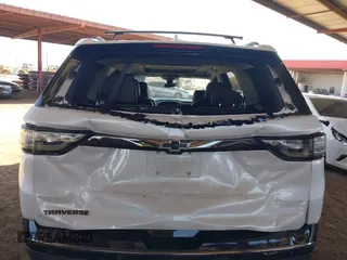 2020 Chevrolet Traverse Premier with VIN 1GNERKKW3LJ117912, listed as a IAAI auction lot 42317330 with 113,576 mi miles and . Bid and sale history available at DreamBid. Image 6.