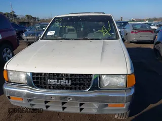 1994 Isuzu Rodeo LS z VIN 4S2CG58V5R4332970, wystawiony jako IAAI lot #41680075 z przebiegiem 182 330 mil mil oraz . Historia ofert i sprzedaży dostępna na DreamBid. Obrazek 6.