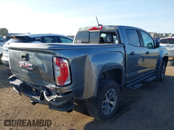 2021 GMC Canyon 4WD AT4 w/Leather with VIN 1GTG6FEN9M1123638, listed as a IAAI auction lot 41852163 with 77,442 mi miles. Bid and sale history available at carsss.com. Image 6.