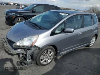 2009 Honda Fit Sport z VIN JHMGE88659S067555, wystawiony jako Copart lot #51693965 z przebiegiem 156 383 mil mil oraz Szkoda całkowita • Salvage title. Historia ofert i sprzedaży dostępna na DreamBid. Obrazek 1.
