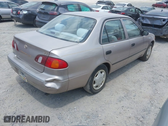 1998 Toyota Corolla VE with VIN 1NXBR12E0WZ051301, listed as a IAAI auction lot 42701905 with Not provided miles and . Bid and sale history available at DreamBid. Image 4.