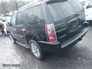 2007 GMC Yukon Denali with VIN 1GKFK63857J238783, listed as a IAAI auction lot 41552949 with 188,298 mi miles. Bid and sale history available at carsss.com. Image 3.