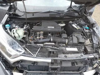 2018 Honda CR-V EX z VIN 7FARW2H50JE094132, wystawiony jako IAAI lot #42337889 z przebiegiem 59 273 mil mil oraz . Historia ofert i sprzedaży dostępna na DreamBid. Obrazek 10.