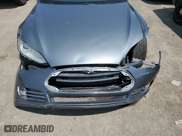 2013 Tesla Model S with VIN 5YJSA1AG9DFP04910, listed as a Copart auction lot 60827335 with 97,022 mi miles and Salvage title. Bid and sale history available at DreamBid. Image 11.