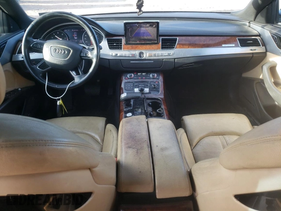 2012 Audi A8 с VIN WAUAVAFD3CN008149, выставлен на аукционе Copart как лот 44489925 с пробегом 125 086 миль миль и Списание • Salvage title. История ставок и продаж доступна на DreamBid. Изображение 8.