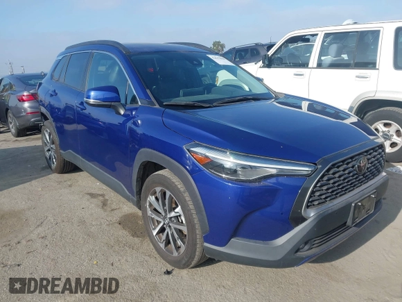 2022 Toyota Corolla Cross XLE with VIN 7MUDAAAG7NV024323, listed as a IAAI auction lot 42643048 with 76,465 mi miles and . Bid and sale history available at DreamBid. Image 1.