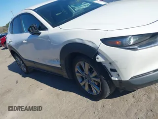 2021 Mazda CX-30 Select with VIN 3MVDMABL3MM239692, listed as a IAAI auction lot 41354738 with 48,928 mi miles and . Bid and sale history available at DreamBid. Image 6.