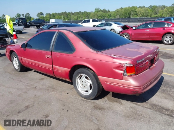 1996 Ford Thunderbird LX z VIN 1FALP62W0TH142986, wystawiony jako IAAI lot #42030900 z przebiegiem 168 993 mil mil oraz . Historia ofert i sprzedaży dostępna na DreamBid. Obrazek 3.