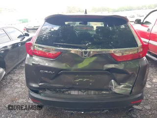 2018 Honda CR-V Touring z VIN 7FARW1H9XJE040530, wystawiony jako IAAI lot #42227446 z przebiegiem 101 299 mil mil oraz . Historia ofert i sprzedaży dostępna na DreamBid. Obrazek 16.