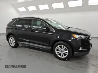 2020 Ford Edge SEL с VIN 2FMPK3J90LBA73990, выставлен на аукционе Copart как лот 61035945 с пробегом 113 511 миль миль и Чистый • Clean title. История ставок и продаж доступна на DreamBid. Изображение 4.