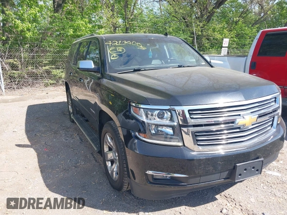 2015 Chevrolet Tahoe LTZ z VIN 1GNSKCKC8FR141163, wystawiony jako IAAI lot #42114008 z przebiegiem 221 804 mil mil oraz . Historia ofert i sprzedaży dostępna na DreamBid. Obrazek 1.