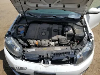 2013 Volkswagen Golf w/Conv & Sunroof z VIN WVWDB7AJ9DW132124, wystawiony jako Copart lot #55153115 z przebiegiem 132 503 mil mil oraz Szkoda całkowita • Salvage title. Historia ofert i sprzedaży dostępna na DreamBid. Obrazek 11.