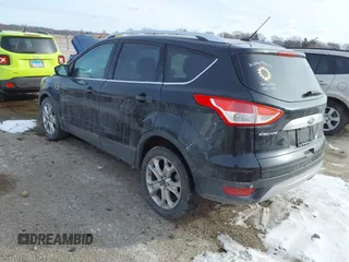 2015 Ford Escape Titanium with VIN 1FMCU0J90FUA32720, listed as a IAAI auction lot 41594336 with 180,250 mi miles. Bid and sale history available at carsss.com. Image 3.