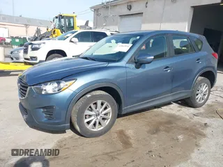 2016 Mazda CX-5 Sport with VIN JM3KE4BY0G0746034, listed as a IAAI auction lot 41842894 with 92,801 mi miles. Bid and sale history available at carsss.com. Image 17.