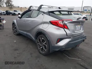 2018 Toyota C-HR XLE with VIN JTNKHMBX5J1011568, listed as a IAAI auction lot 42043867 with 30,699 mi miles. Bid and sale history available at carsss.com. Image 3.