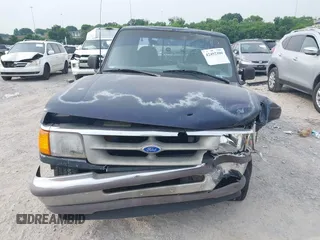 1995 Ford Ranger XL with VIN 1FTCR14A2SPB08707, listed as a IAAI auction lot 42492100 with 144,747 mi miles and . Bid and sale history available at DreamBid. Image 12.