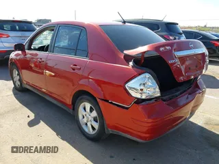 2011 Nissan Versa 1.8 S with VIN 3N1BC1AP6BL394131, listed as a IAAI auction lot 42013750 with 161,748 mi miles. Bid and sale history available at carsss.com. Image 3.
